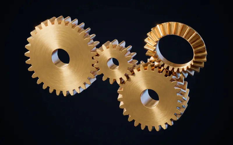 A group of generated gears: a meshing spur pair, a herringbone gear and a bevel gear