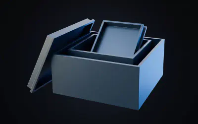 Two nesting storage boxes in different sizes with their lids leaning against them